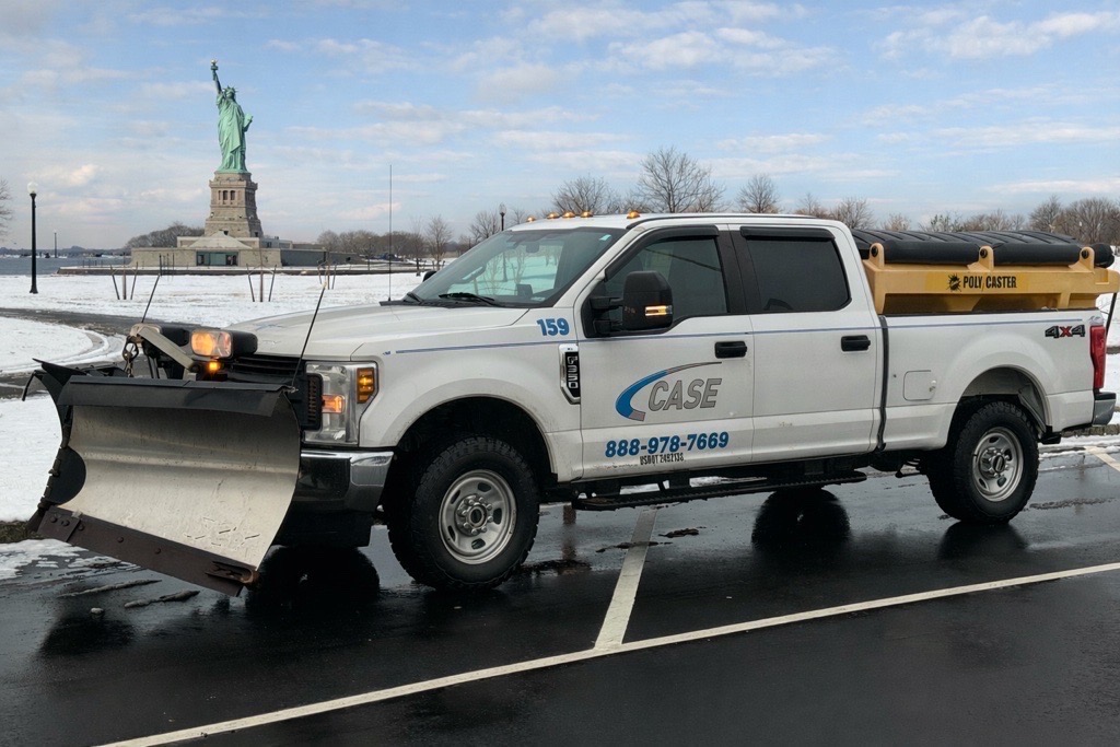 Truck in front of Statue of Liberty